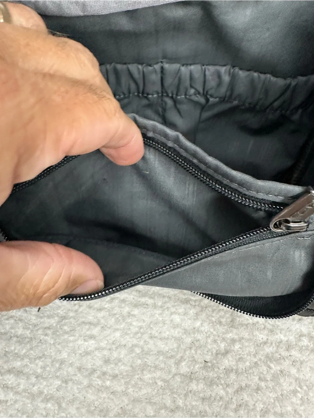Tumi Black Toiletry Bag with Red Accents